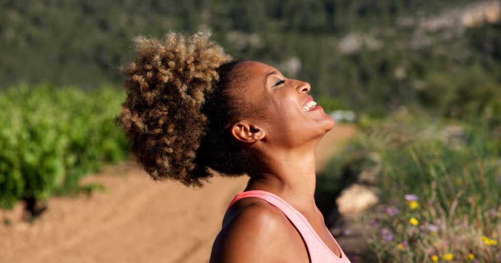 woman looking upward with peaceful expression symbolizing trust God when life doesn't make sense